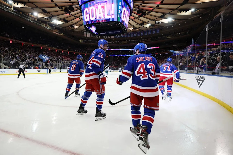 Dancing Larry, a New Jersey resident, is famous for a song-and-dance routine he does during home games, which are featured on Madison Square Garden's jumbotron. A new lawsuit by an arena staffer claims the fan favorite gets overly handsy with employees, but that MSG management ignored their complaints (Getty Images)