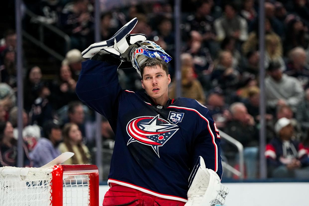 Columbus Blue Jackets goaltender Elvis Merzlikins (90) puts his helmet on in the second period of the NHL game at Nationwide Arena on Saturday, March 28, 2026 in Columbus, Ohio.