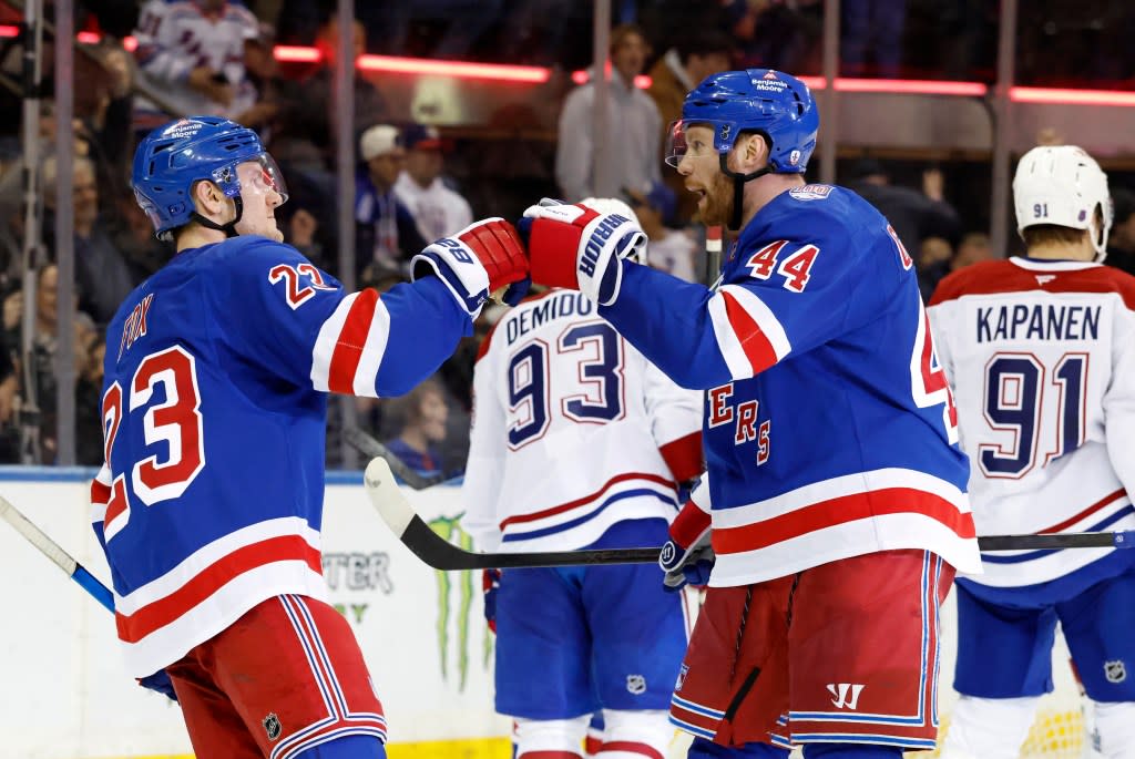 Defenseman Vladislav Gavrikov of the New York Rangers greets defenseman Adam Fox after Fox scores a goal during the third period at Madison Square Garden on April 2, 2026. Jason Szenes for the New York Post