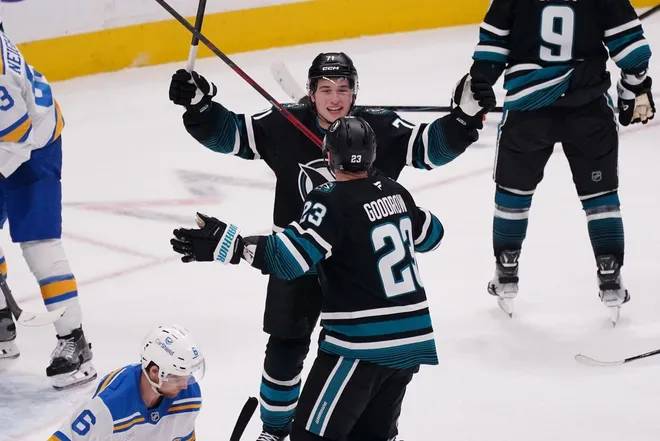 Mar 30, 2026; San Jose, California, USA; San Jose Sharks center Macklin Celebrini (71) celebrates with San Jose Sharks center Barclay Goodrow (23) at the end of the third period against the St. Louis Blues at SAP Center at San Jose.