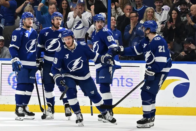 Mar 31, 2026; Tampa, Florida, USA; Tampa Bay Lightning center Jake Guentzel (59) celebrates with his teammates after scoring a goal in the first period against the Montreal Canadian at Benchmark International Arena.