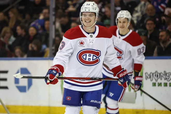 Apr 2, 2026; New York, New York, USA; Montréal Canadiens right wing Cole Caufield (13) skates back onto the ice after scoring a goal in the second period against the New York Rangers at Madison Square Garden.