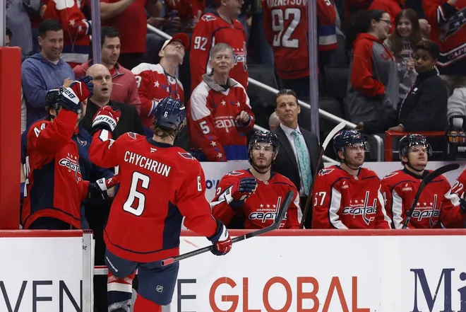 Mar 31, 2026; Washington, District of Columbia, USA; Washington Capitals defenseman Jakob Chychrun (6) celebrates with teammates after scoring a goal against the Philadelphia Flyers during the second period at Capital One Arena.