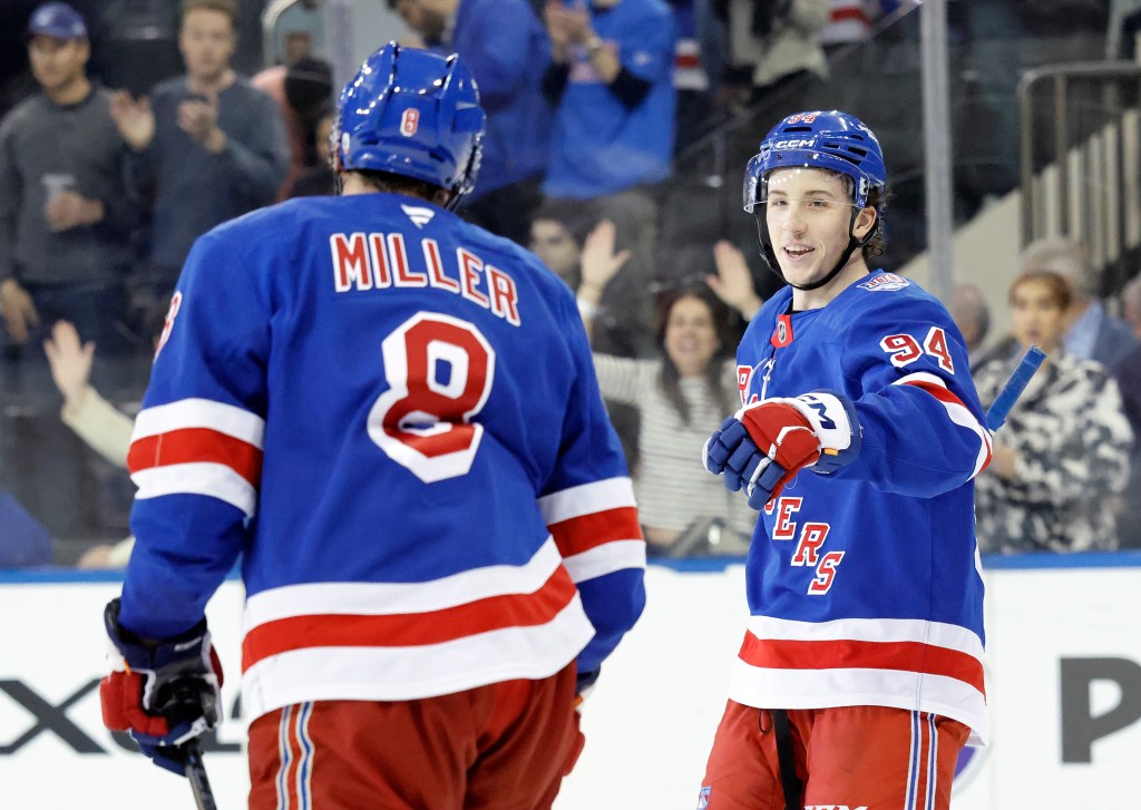New York Rangers is greeted by center J.T. Miller #8 of the New York Rangers after he scores a goal during the third period at Madison Square Garden, Saturday April 4th, 2026, in New York, NY.
