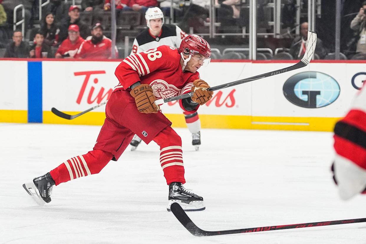 Detroit Red Wings right wing Patrick Kane (88) shoots the puck against New Jersey Devils during the first period at Little Caesars Arena in Detroit on Saturday, April 11, 2026.