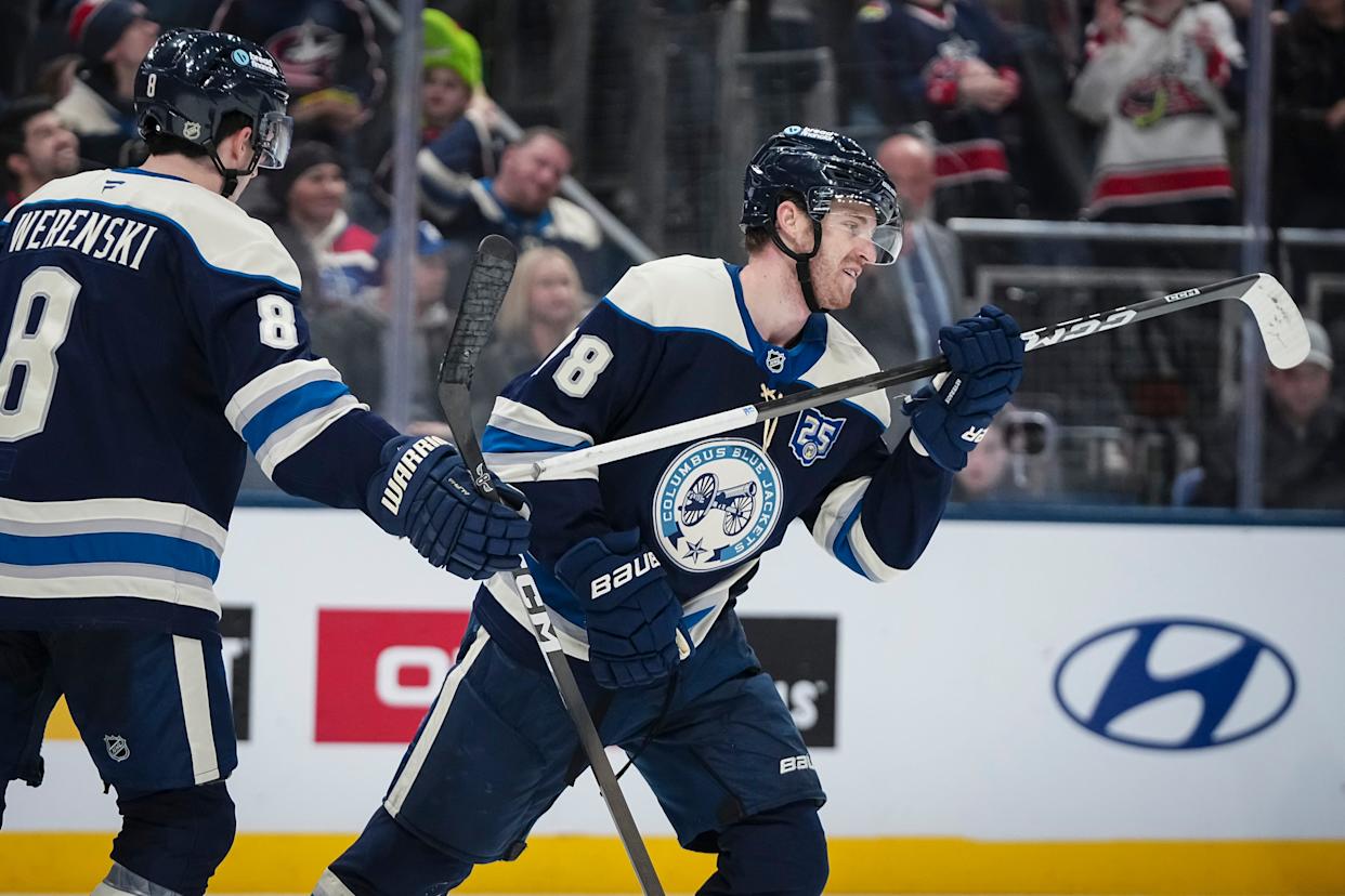 Columbus Blue Jackets defenseman Damon Severson (78) celebrates a goal with defenseman Zach Werenski (8) during the third period of the NHL game against the New York Rangers at Nationwide Arena in Columbus on March 19, 2026. The Blue Jackets won 6-3.