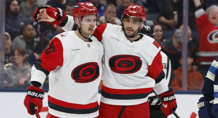Mar 31, 2026; Columbus, Ohio, USA; Carolina Hurricanes defenseman Shayne Gostisbehere (4) celebrates his goal against the Columbus Blue Jackets during the first period at Nationwide Arena.
