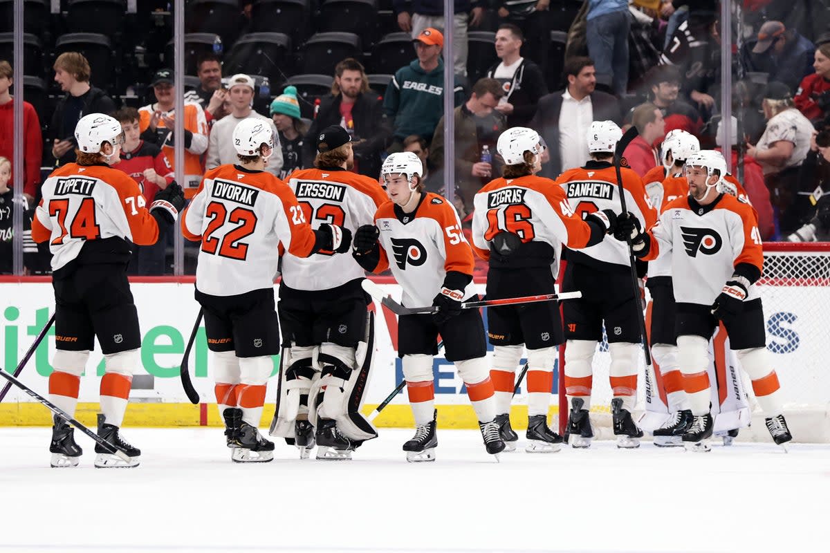 Flyers celebrating making it to the playoffs after defeating the Chicago Blackhawks (Copyright 2026 The Associated Press. All rights reserved.)