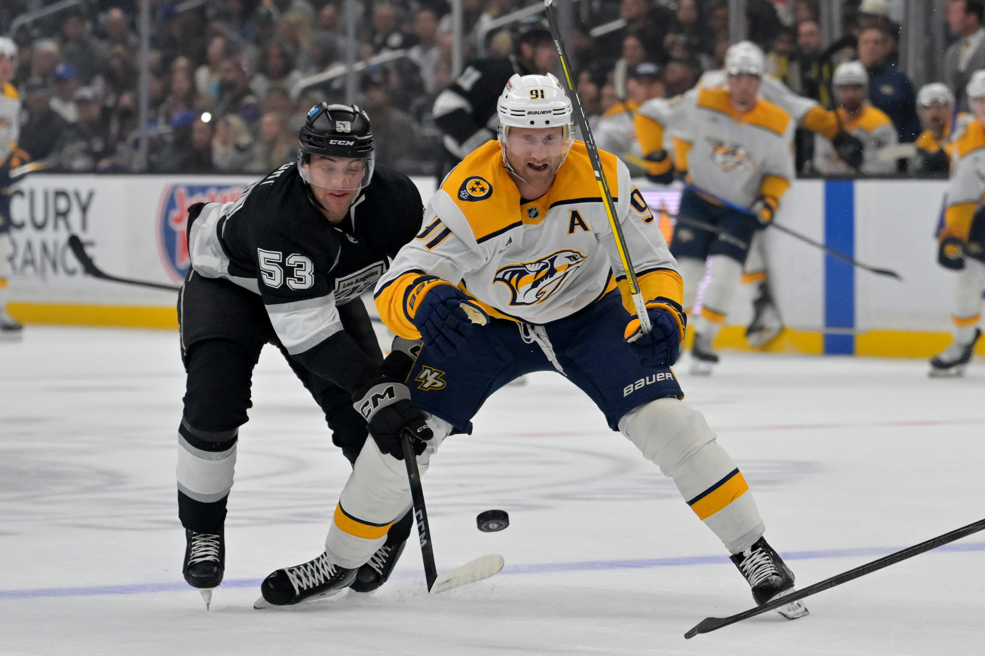 Kings right wing Jared Wright, left, and Nashville Predators center...