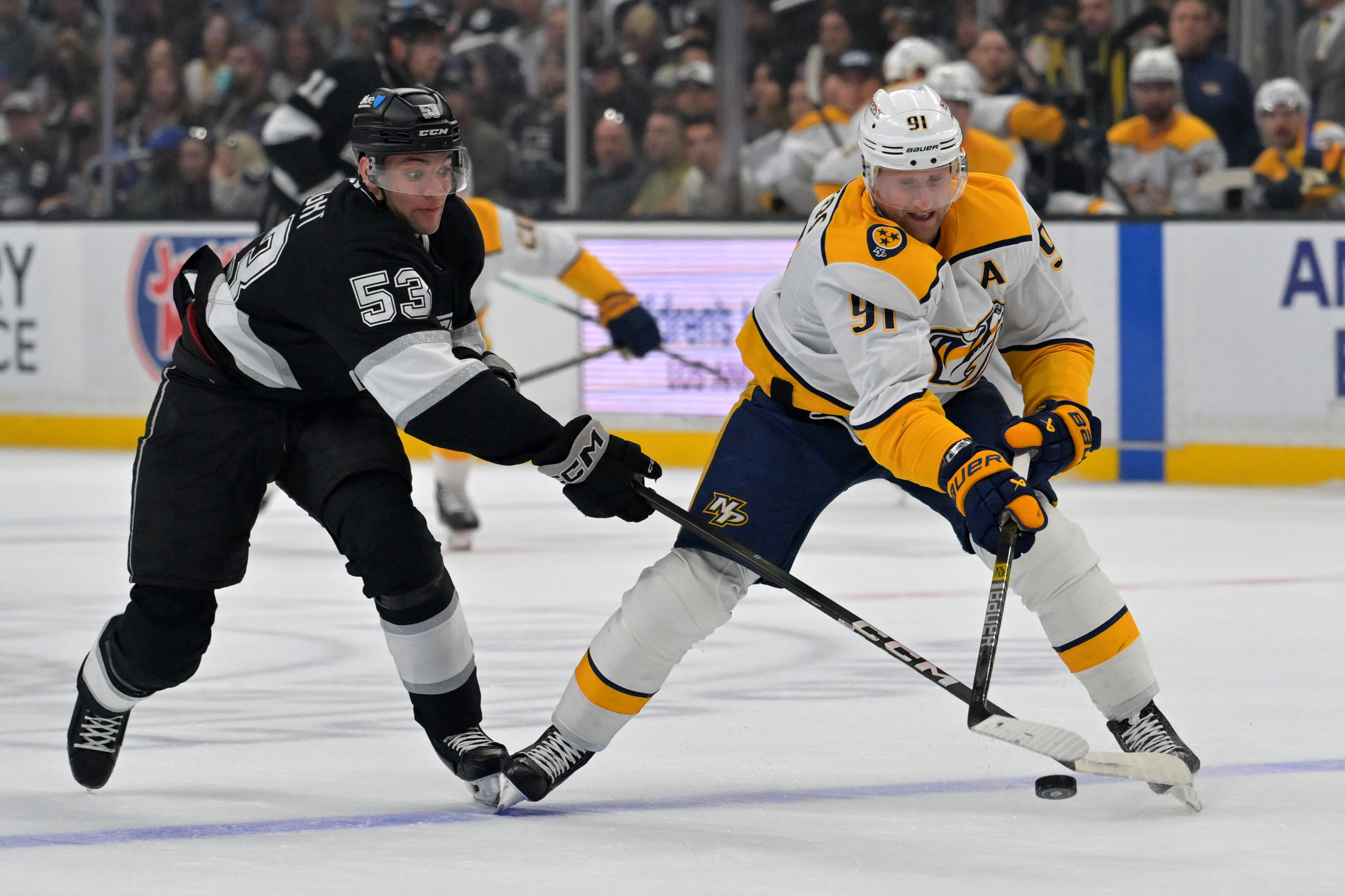 Kings right wing Jared Wright, left, and Nashville Predators center...