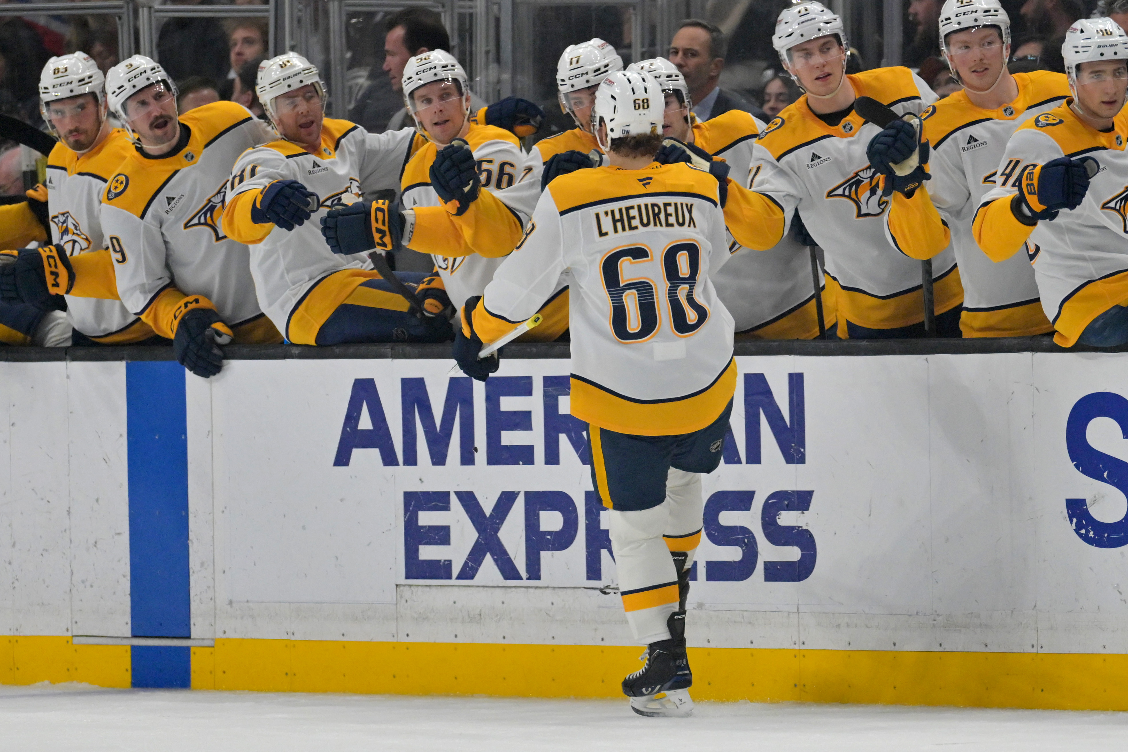 Nashville Predators left wing Zachary L’heureux (68) is congratulated at...