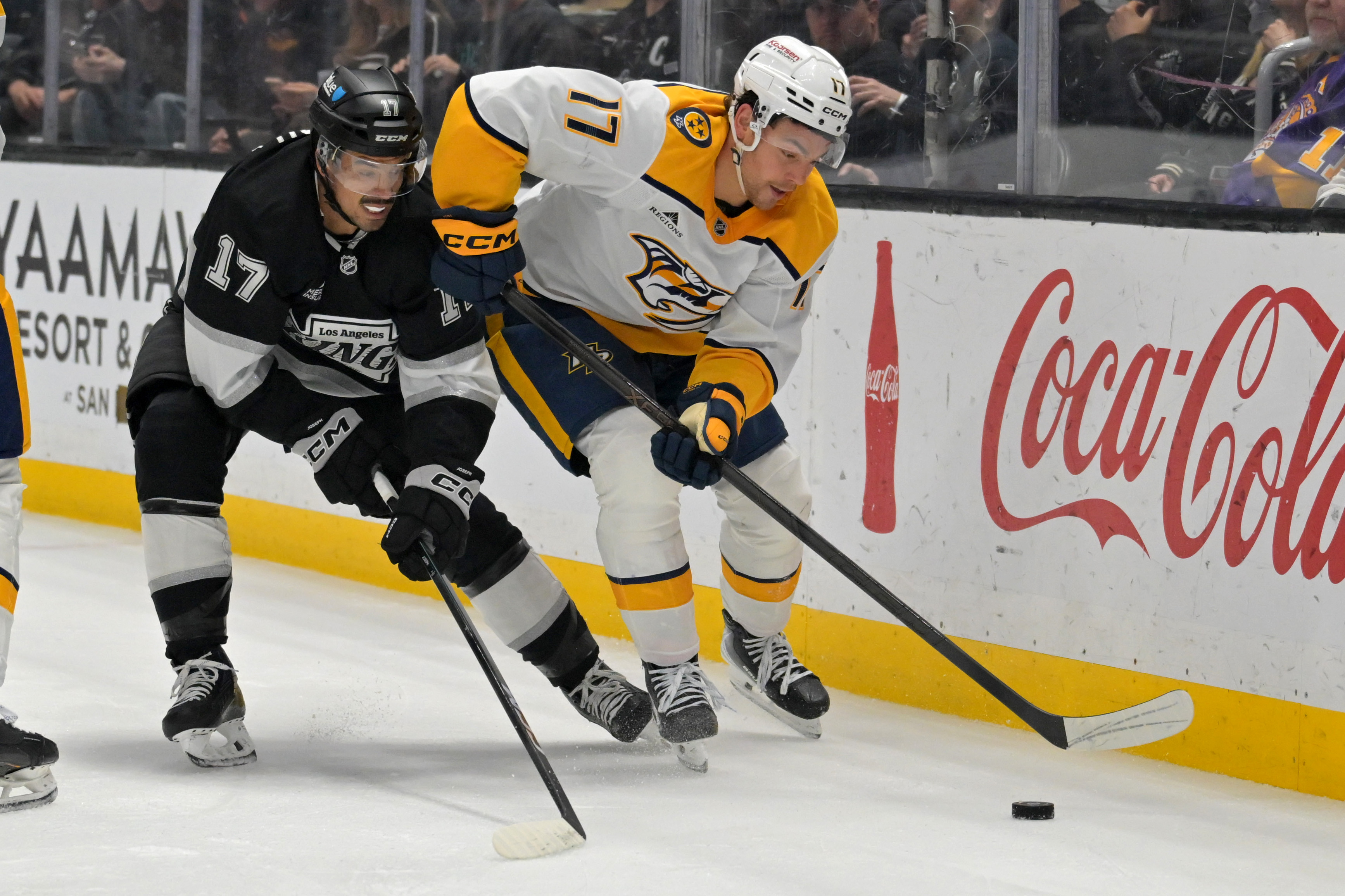 Kings right wing Mathieu Joseph, left, and Nashville Predators right...