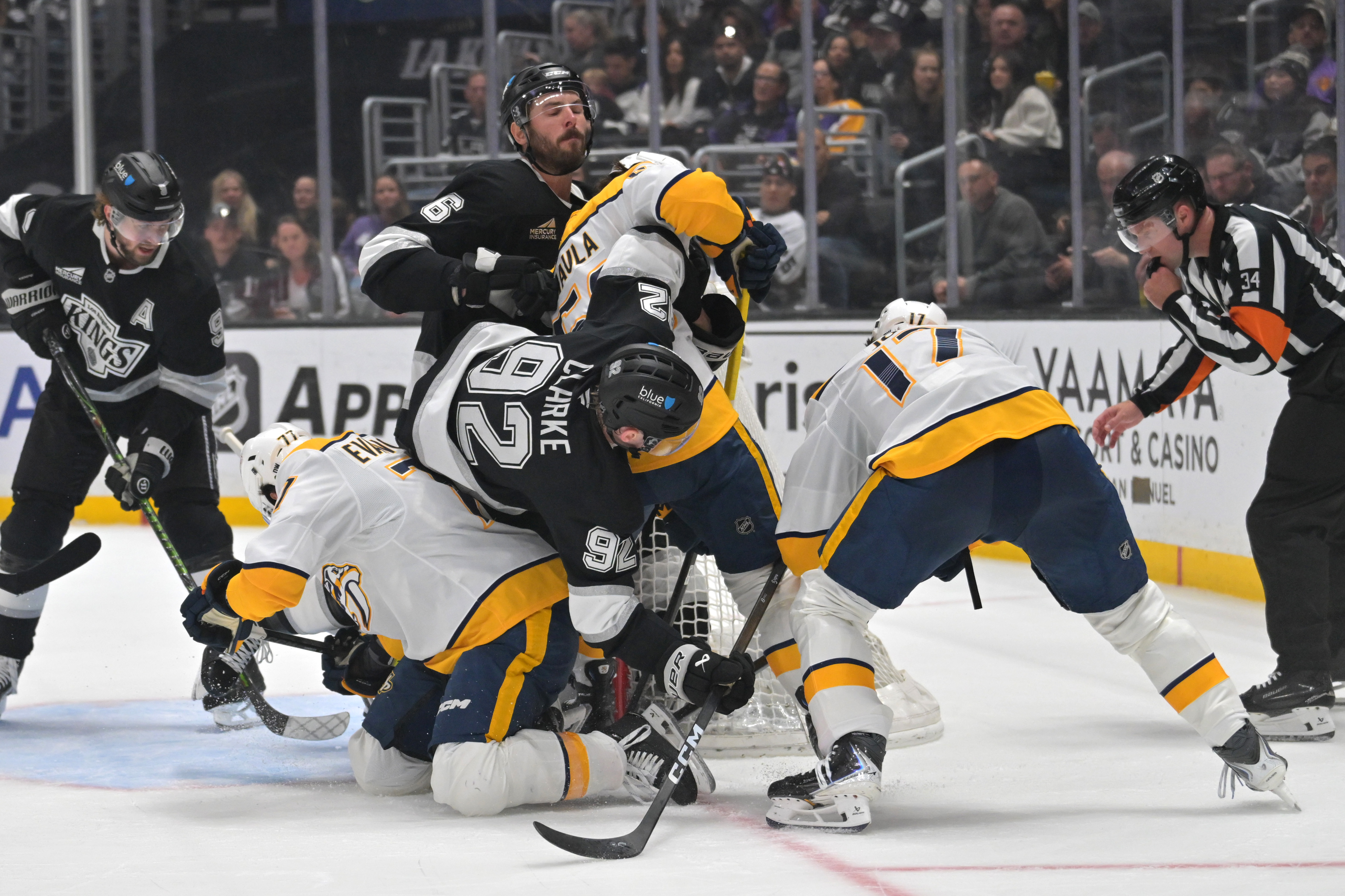 Kings defenseman Brandt Clarke (92), Kings defenseman Joel Edmundson, Nashville...