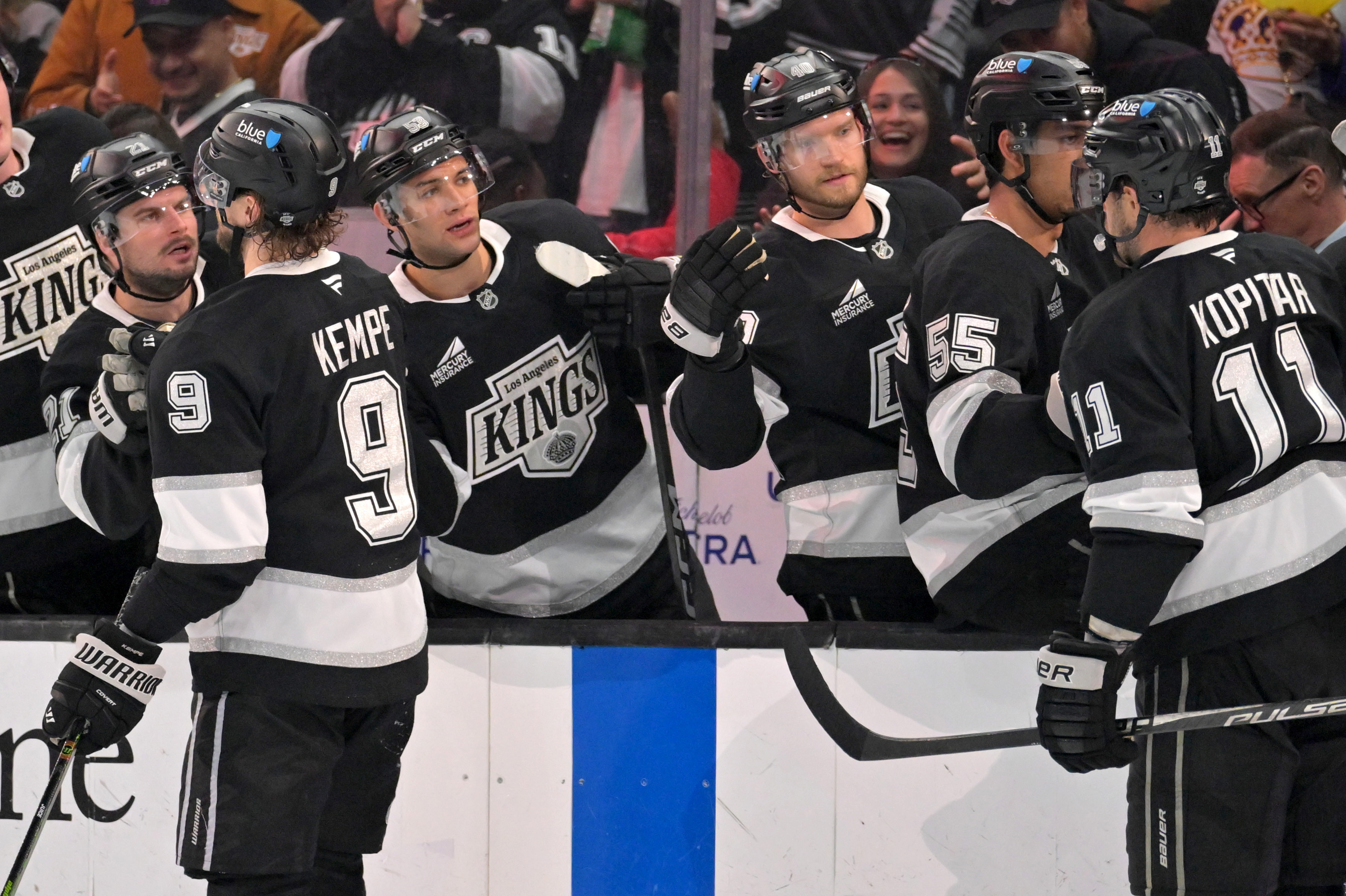 Kings right wing Adrian Kempe (9) and Kings center Anze...