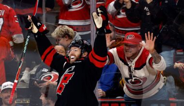 Hurricanes hit milestones, clinch division with OT win over Bruins
