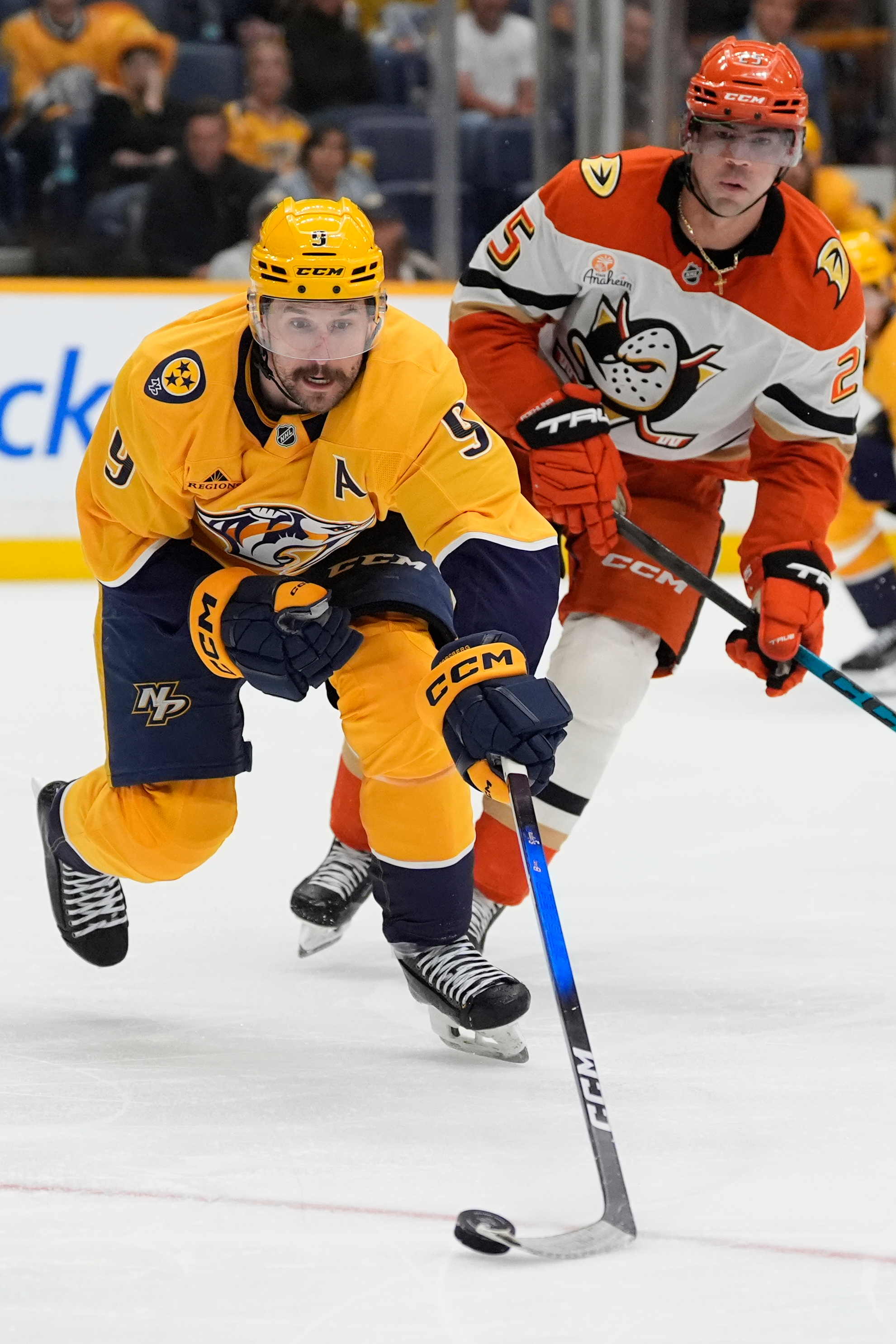 Nashville Predators left wing Filip Forsberg (9) skates the puck...