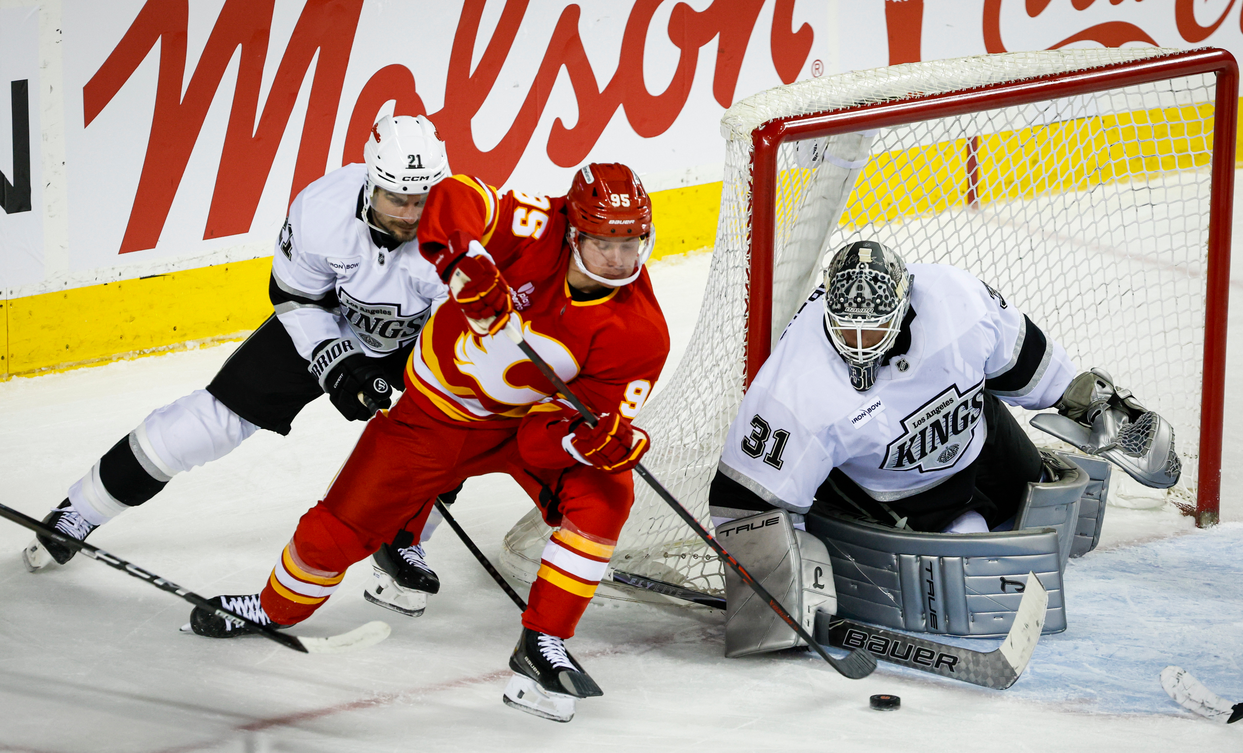 Kings goaltender Anton Forsberg, right, protects the near post against...