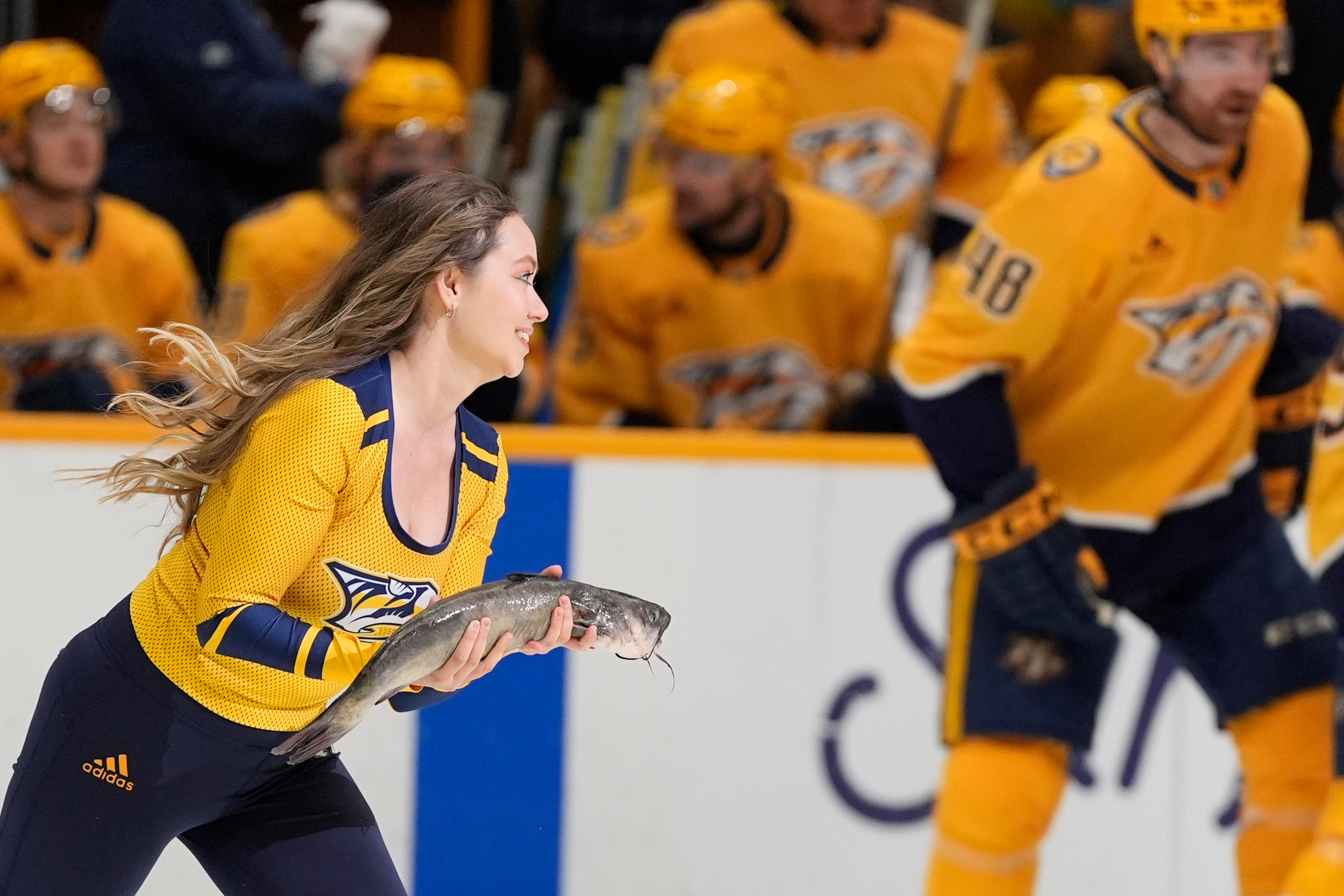 A catfish is removed from the ice before the first...