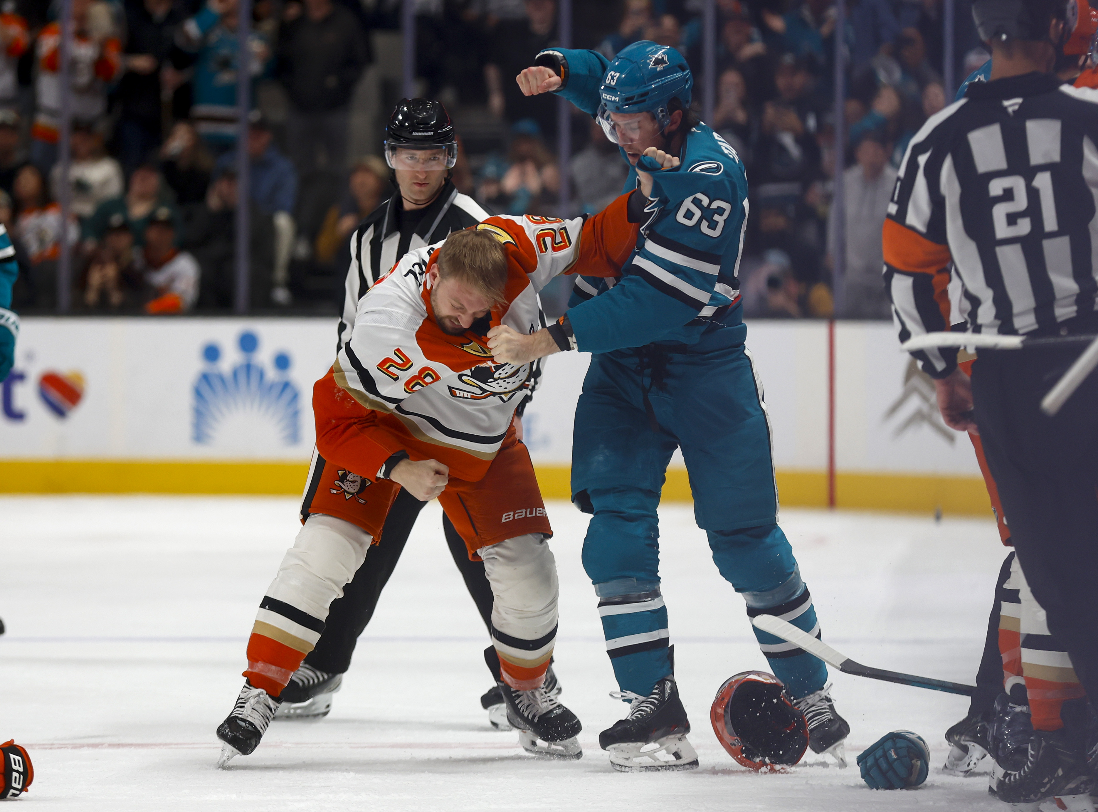 San Jose Sharks' Zack Ostapchuk (63) fights with against Anaheim...