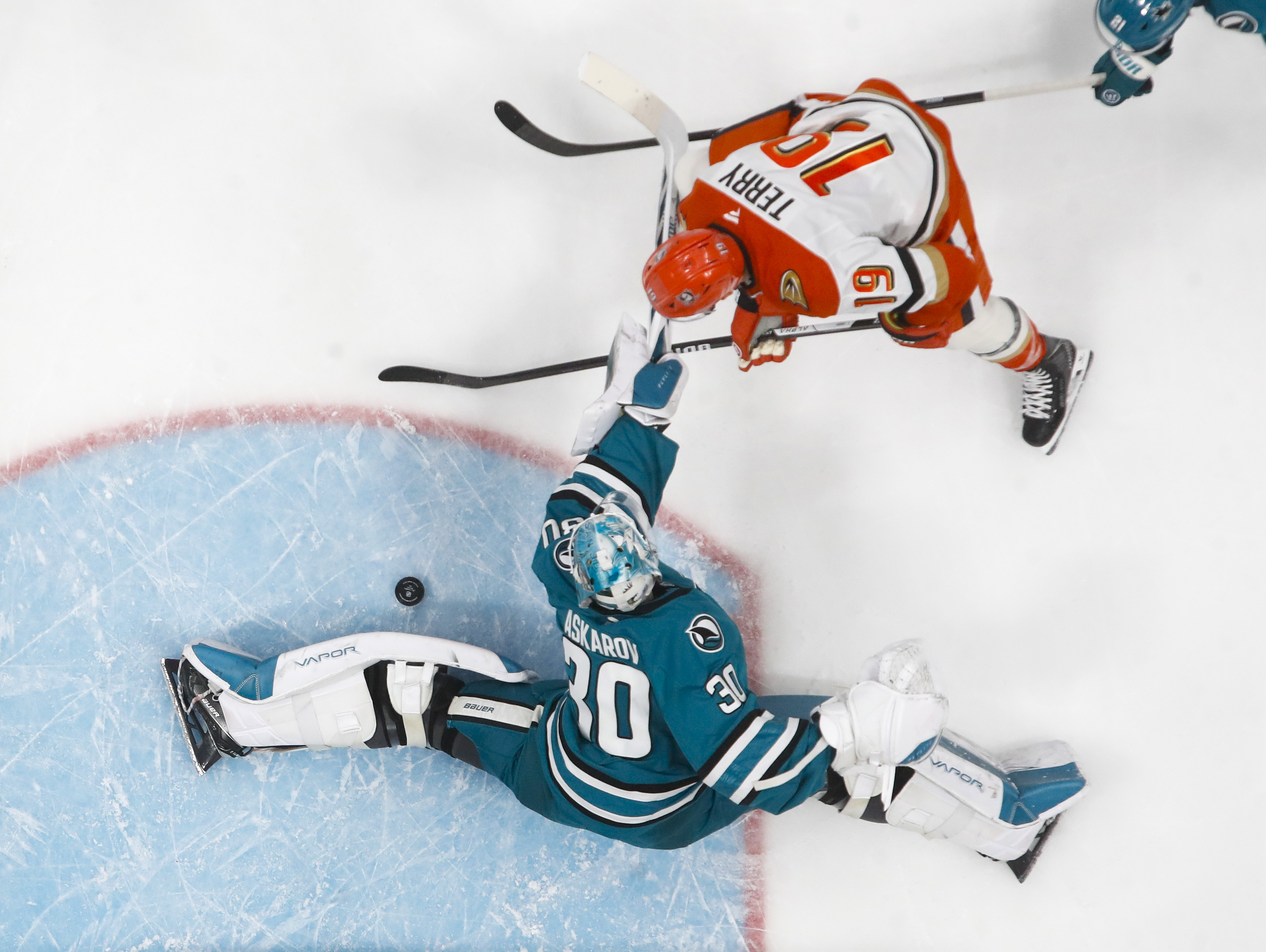San Jose Sharks goaltender Yaroslav Askarov (30) blocks a shot...