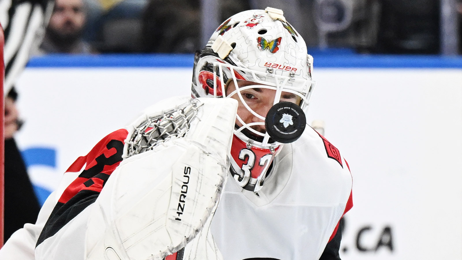 Carolina Hurricanes goalie Brandon Bussi (32) makes a save against the Toronto Maple Leafs in the third period at Scotiabank Arena.