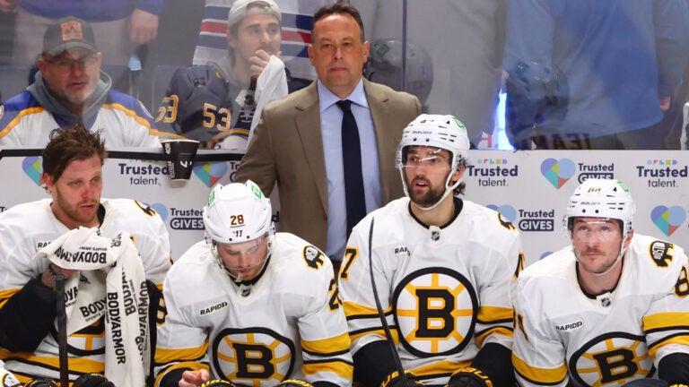 Boston Bruins head coach Marco Strum looks on during the third period in Game 1 of a first-round NHL hockey Stanley Cup playoff series against the Buffalo Sabres Sunday, April 19, 2026, in Buffalo, N.Y.