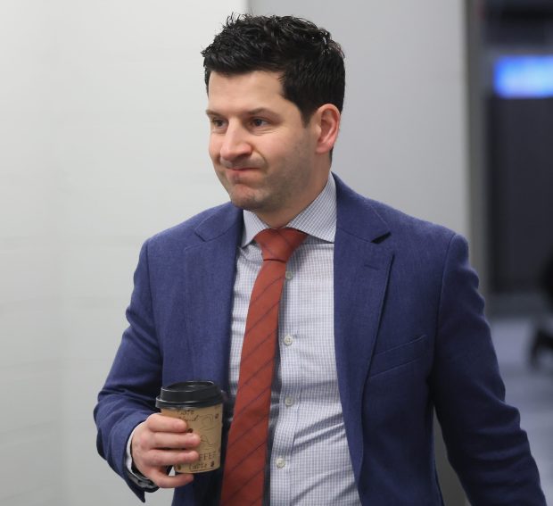 Blackhawks general manager Kyle Davidson arrives for a game against the Islanders on March 24, 2026, in Elmont, N.Y. (Bruce Bennett/Getty Images)