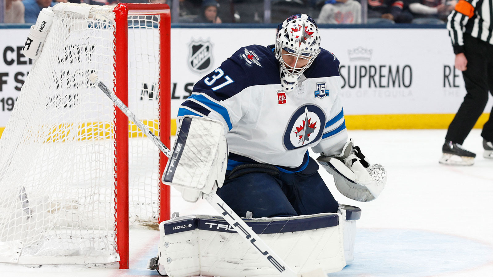 Winnipeg Jets goalie Connor Hellebuyck (37) makes a save against the Columbus Blue Jackets during the second period at Nationwide Arena. 
