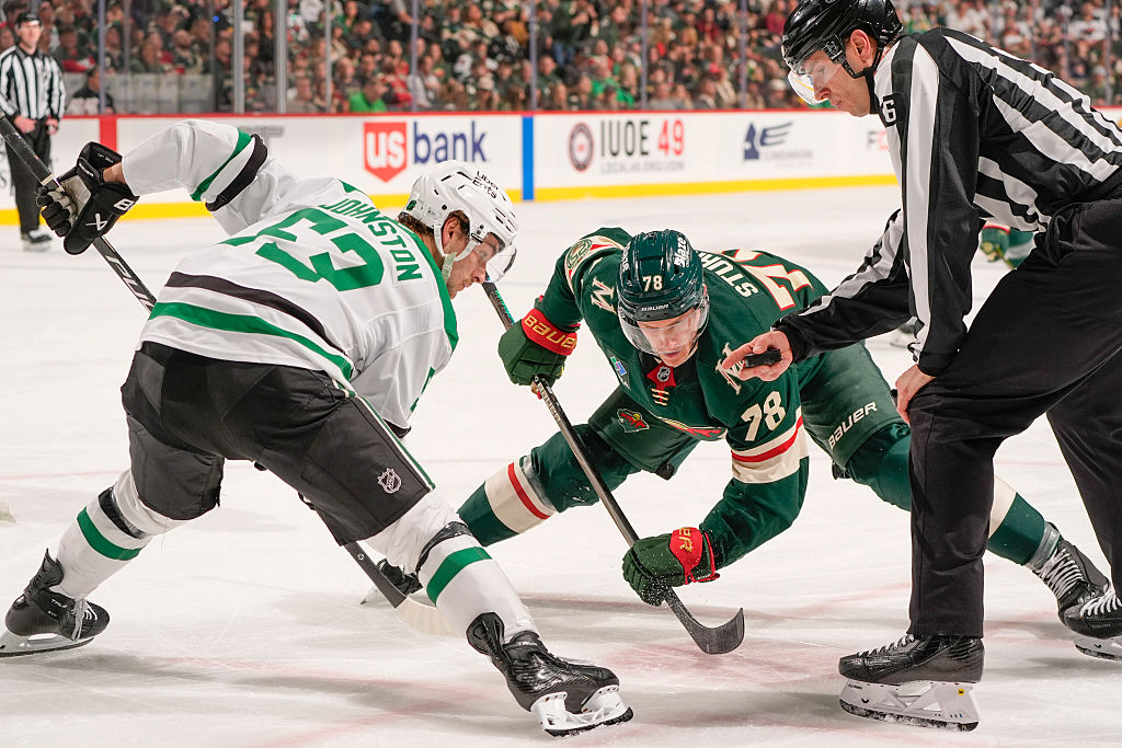 SAINT PAUL, MN - MARCH 21: Wyatt Johnston #53 of the Dallas Stars takes a face-off against Nico Sturm #78 of the Minnesota Wild during the game at Grand Casino Arena on March 21, 2026 in Saint Paul, Minnesota. (Photo by Bruce Kluckhohn/NHLI via Getty Images)