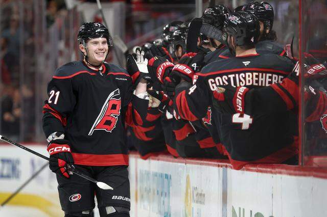 Alexander Nikishin of the Carolina Hurricanes celebrates with his team following his goal scored during the first period against the Columbus Blue Jackets at Lenovo Center on April 2, 2026 in Raleigh, North Carolina.