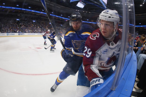 ST LOUIS, MISSOURI - APRIL 7: Pavel Buchnevich #89 of the St. Louis Blues checks Nathan MacKinnon #29 of the Colorado Avalanche in the second period at Enterprise Center on April 7, 2026 in St Louis, Missouri. (Photo by Dilip Vishwanat/Getty Images)
