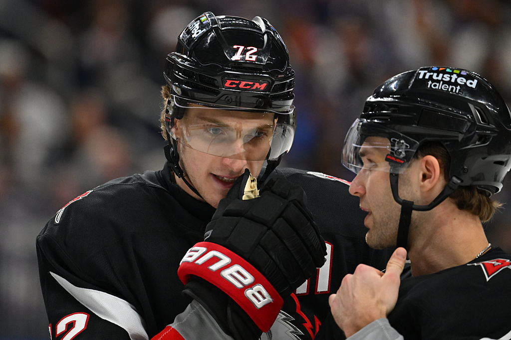 BUFFALO, NEW YORK - APRIL 6: Josh Norris #9 talks with Tage Thompson #72 of the Buffalo Sabres before a faceoff during an NHL game against the Tampa Bay Lightning at KeyBank Center on April 6, 2026 in Buffalo, New York. (Photo by Joe Hrycych/Getty Images)