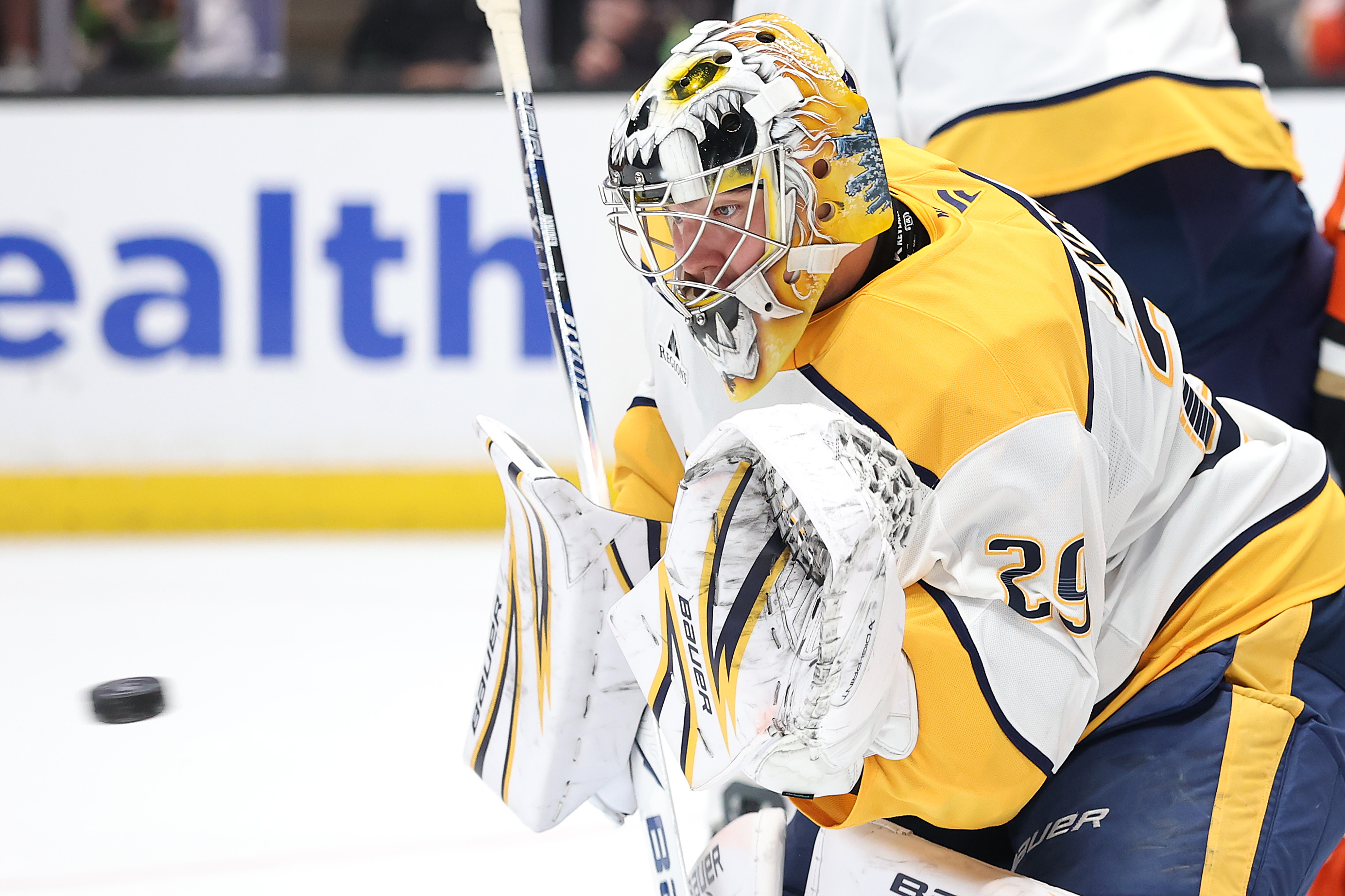 Nashville Predators goaltender Justus Annunen makes a glove save during...