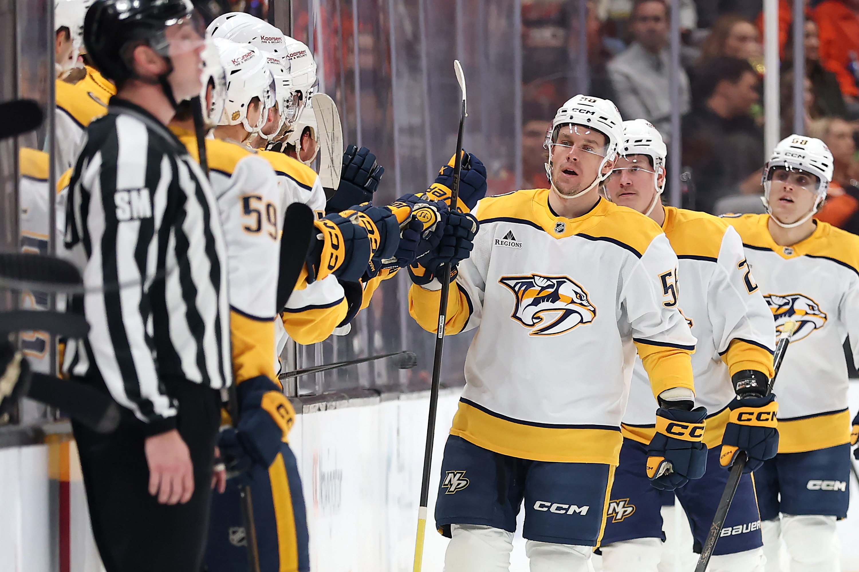 The Nashville Predators’ Erik Haula (56) is congratulated at the...