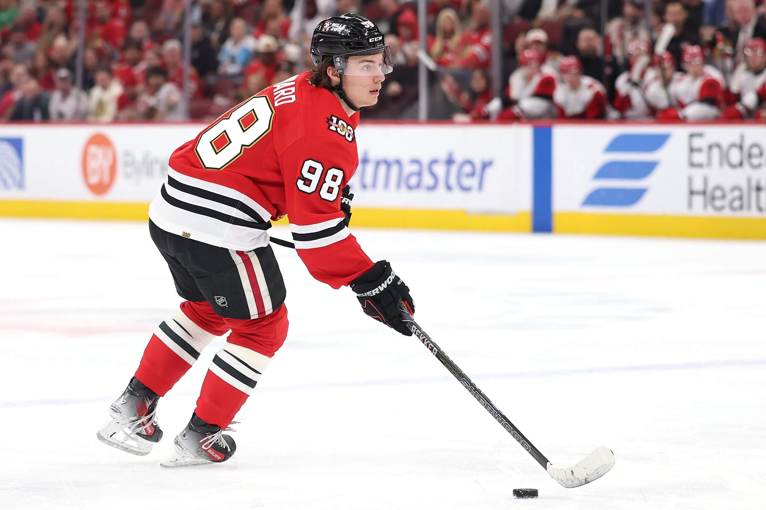 Connor Bedard handles the puck.