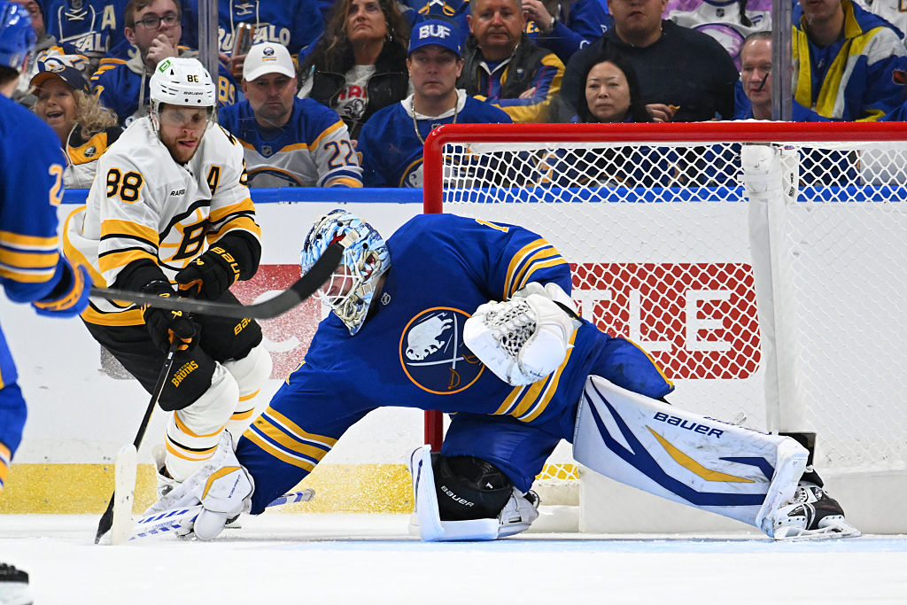 BUFFALO, NEW YORK - APRIL 19: Ukko-Pekka Luukkonen #1 of the Buffalo Sabres makes a save against David Pastrnak #88 of the Boston Bruins during the second period in Game One of the First Round of the 2026 Stanley Cup Playoffs at KeyBank Center on April 19, 2026 in Buffalo, New York. (Photo by Joe Hrycych/Getty Images)