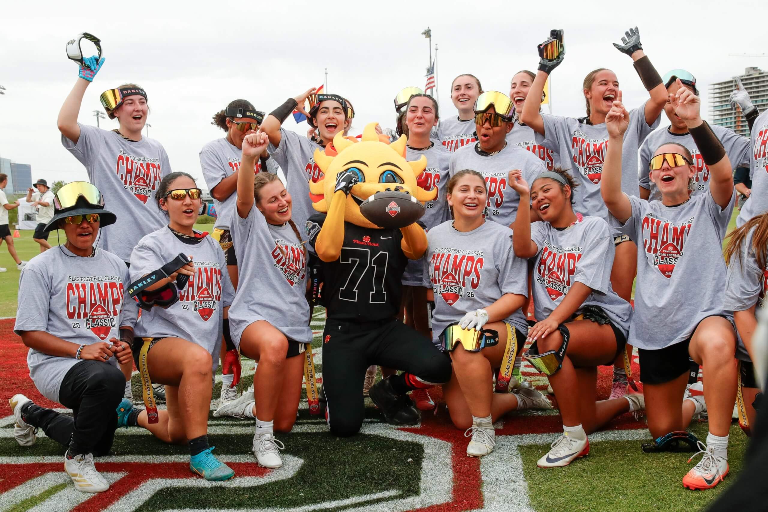 UCF women's flag football team celebrates winning the Fiesta Bowl Classic.