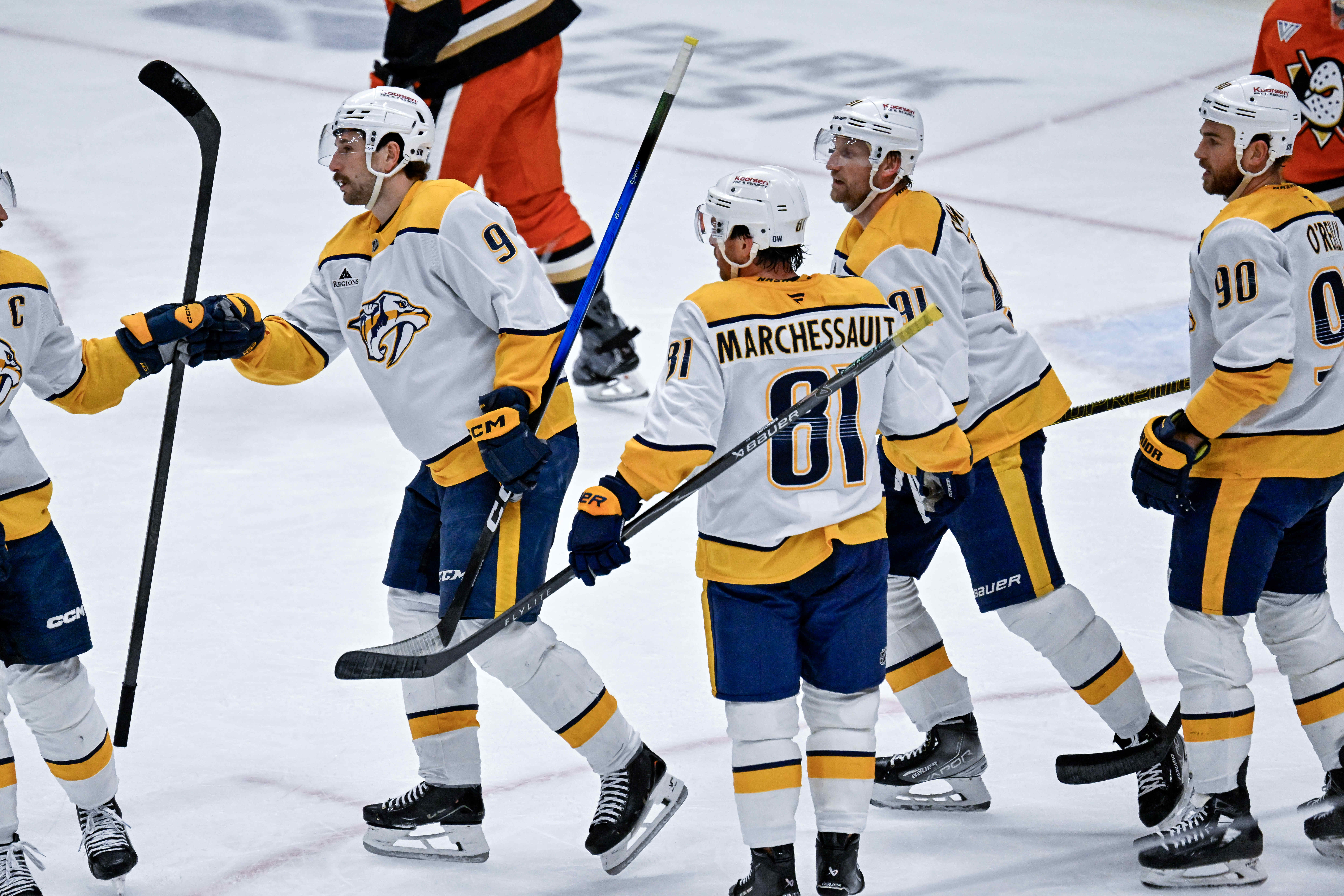 Nashville Predators players celebrate after a goal by Brady Skjei...