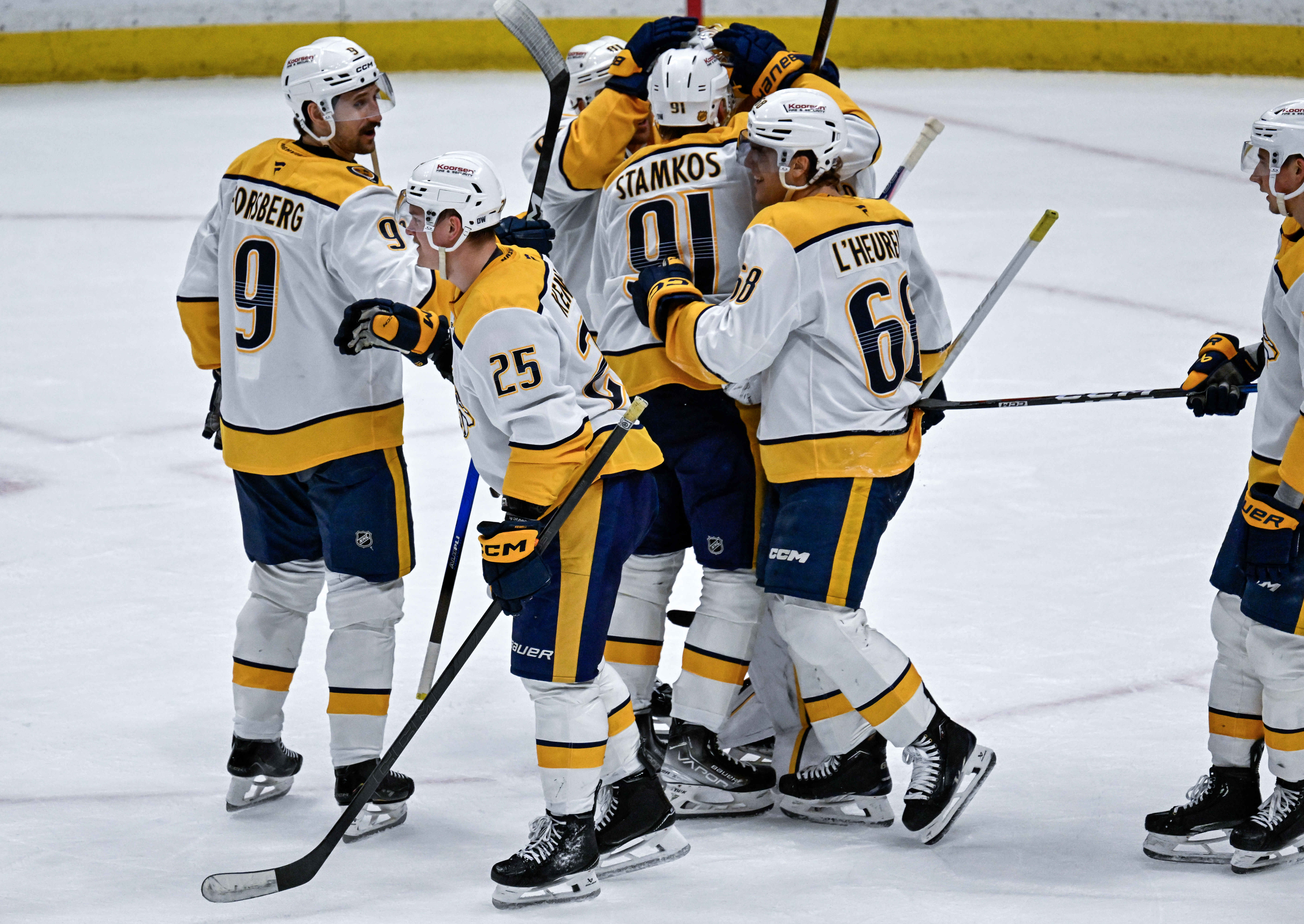 Nashville Predators players celebrate after their 5-0 victory over the...