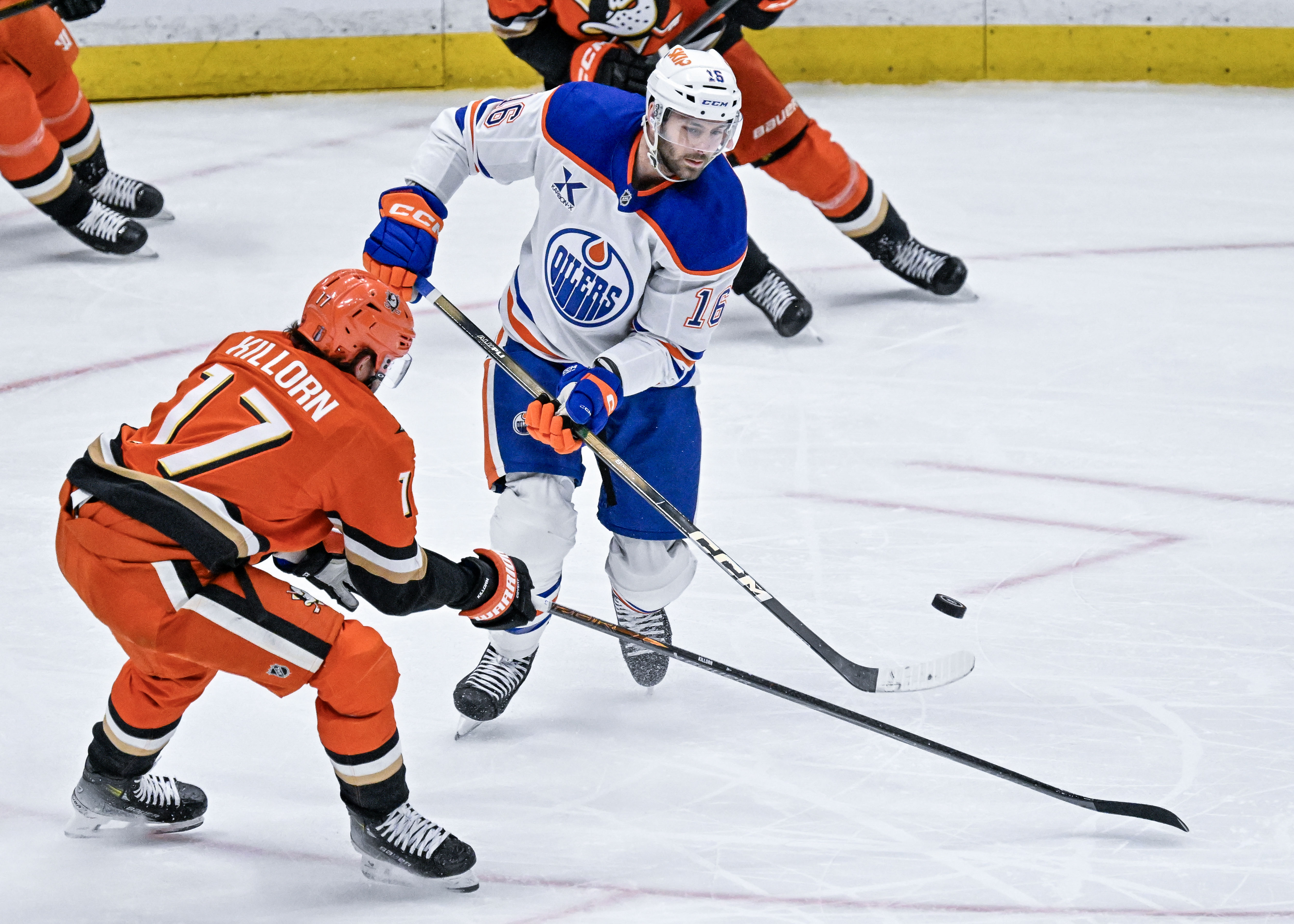 The Oilers Jason Dickinson (16) controls the puck during the...