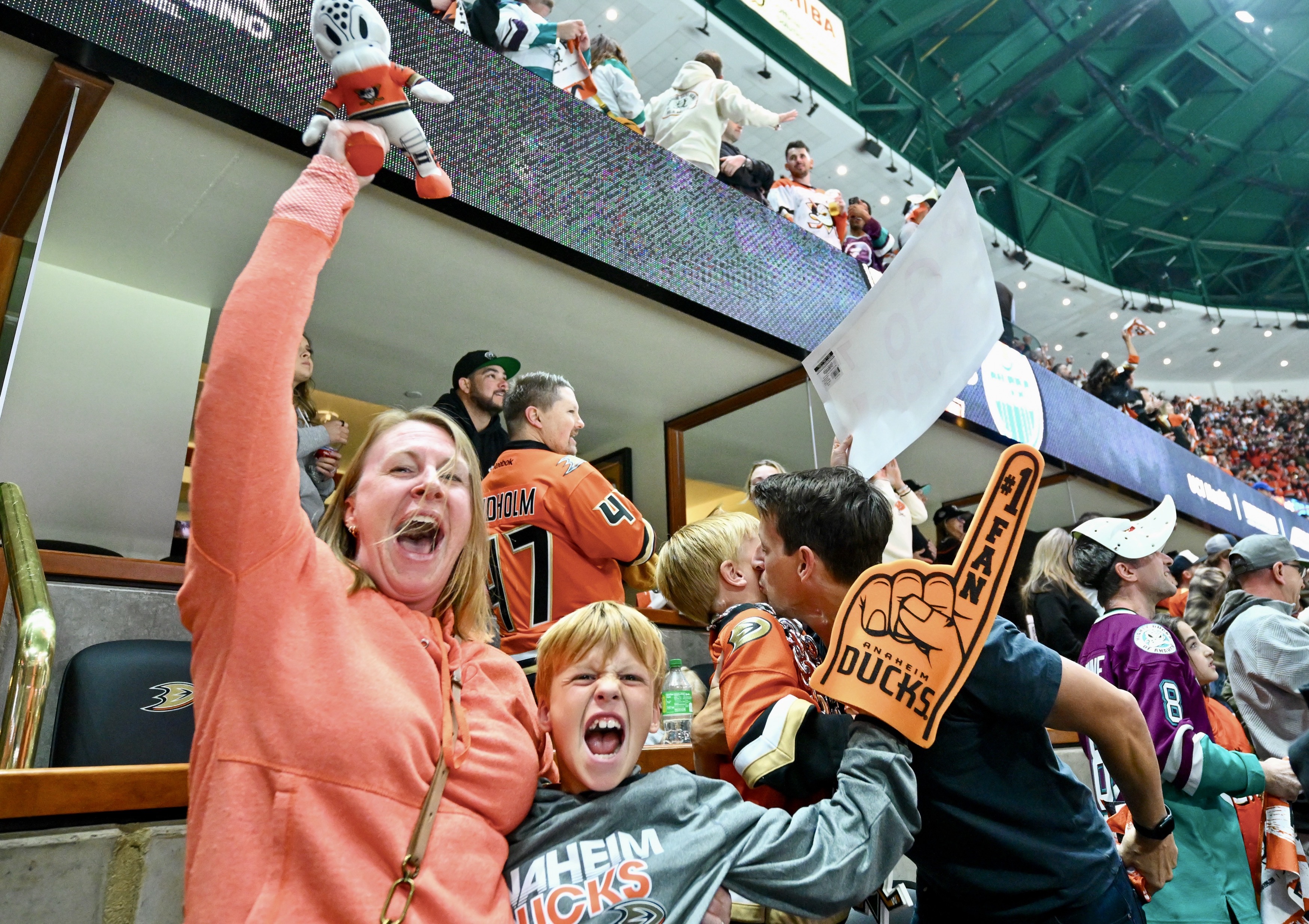 Kelley Bolar and her son, Emmett Calvert, 9, celebrate the...