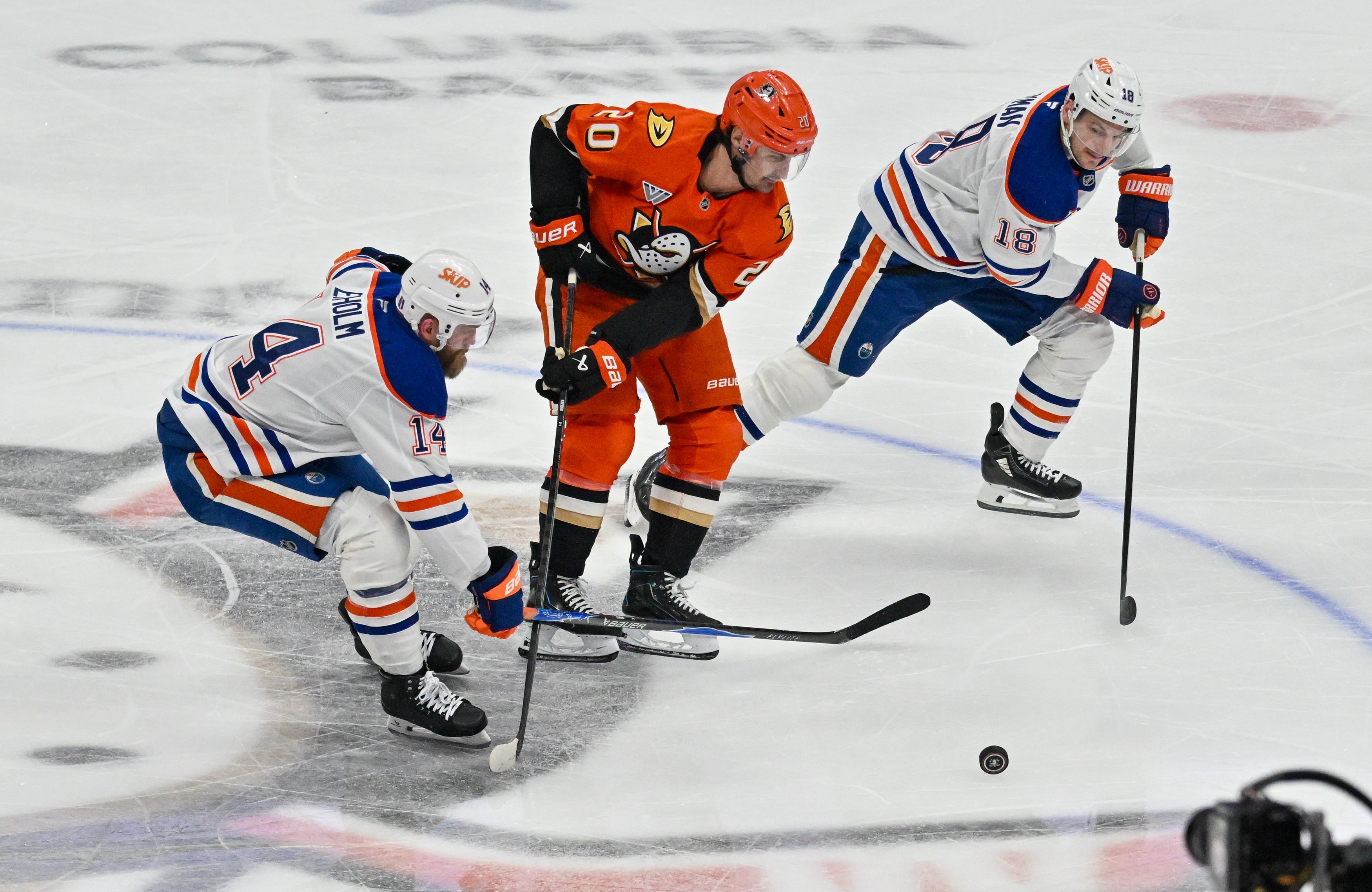 Edmonton Oilers Mattias Ekholm (14) and Zach Hyman (18) battle...