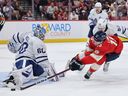 Panthers forward Anton Lundell has a shot blocked by Maple Leafs goaltender Joseph Woll during second period NHL action at Amerant Bank Arena in Sunrise, Fla., on Dec. 2, 2025.