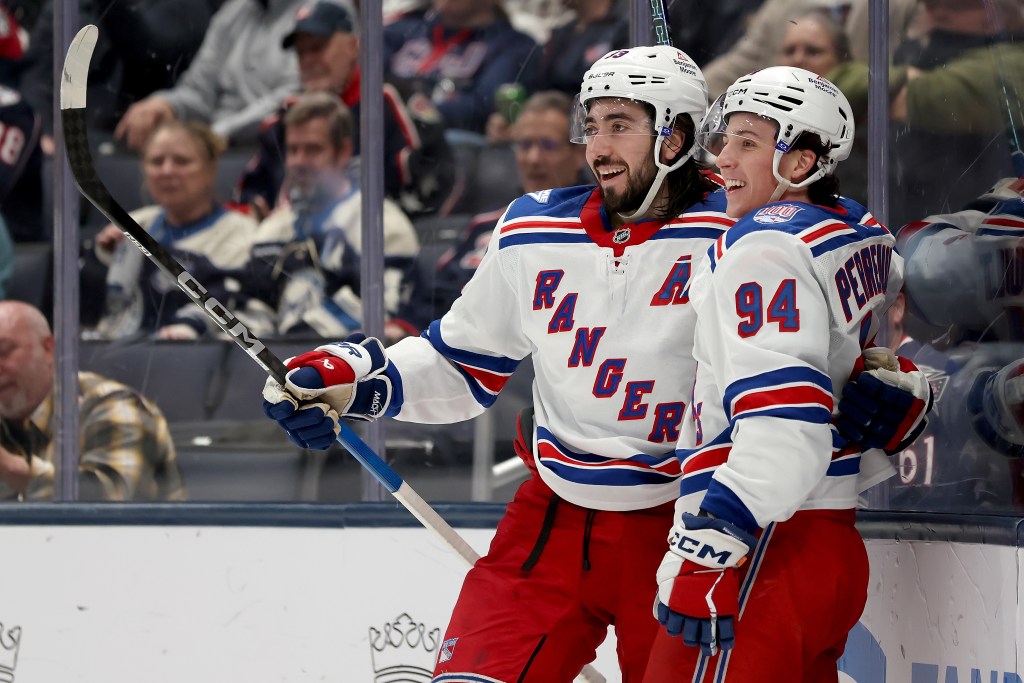 Mika Zibanejad (left) is congratulated by Gabe Perrault after scoring a goal during the second period of the Rangers' loss to the Blue Jackets on March 19, 2026.