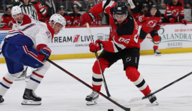 Jack Hughes stick handles through Montreal's defense on Saturday night at the Prudential Center.