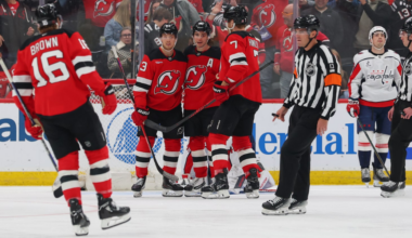 Jack Hughes celebrates his third period goal against the Washington Capitals with teammates Connor Brown, Jesper Bratt and Dougie Hamilton.