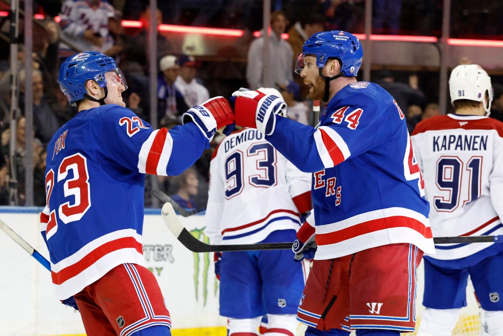 Defenseman Vladislav Gavrikov #44 of the New York Rangers greets defenseman Adam Fox #23 of the New York Rangers after Fox scores a goal during the third period at Madison Square Garden, Thursday April 2nd, 2026, in New York, NY. 