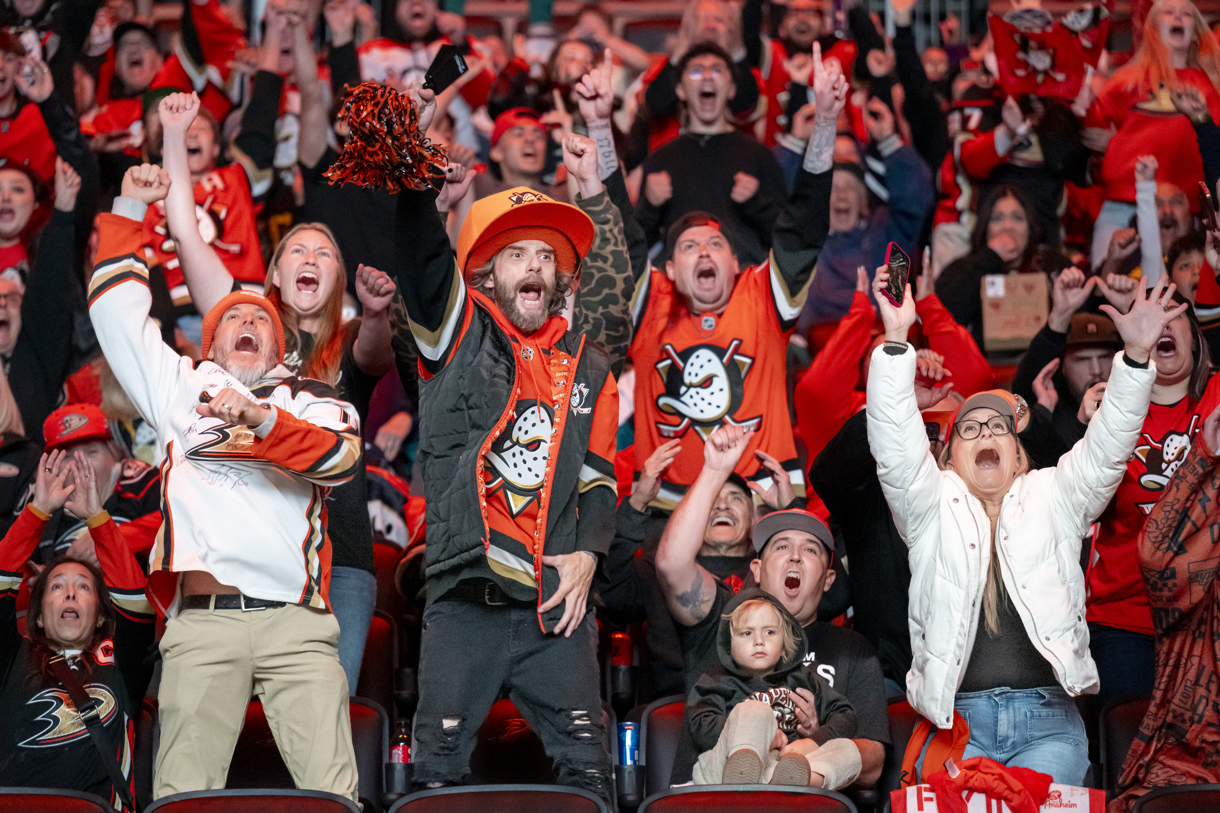 Ducksâ fans react when the Ducks score a goal in...