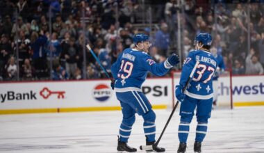 League-worst Canucks stun Avalanche 8-6; MacKinnon scores 50th goal