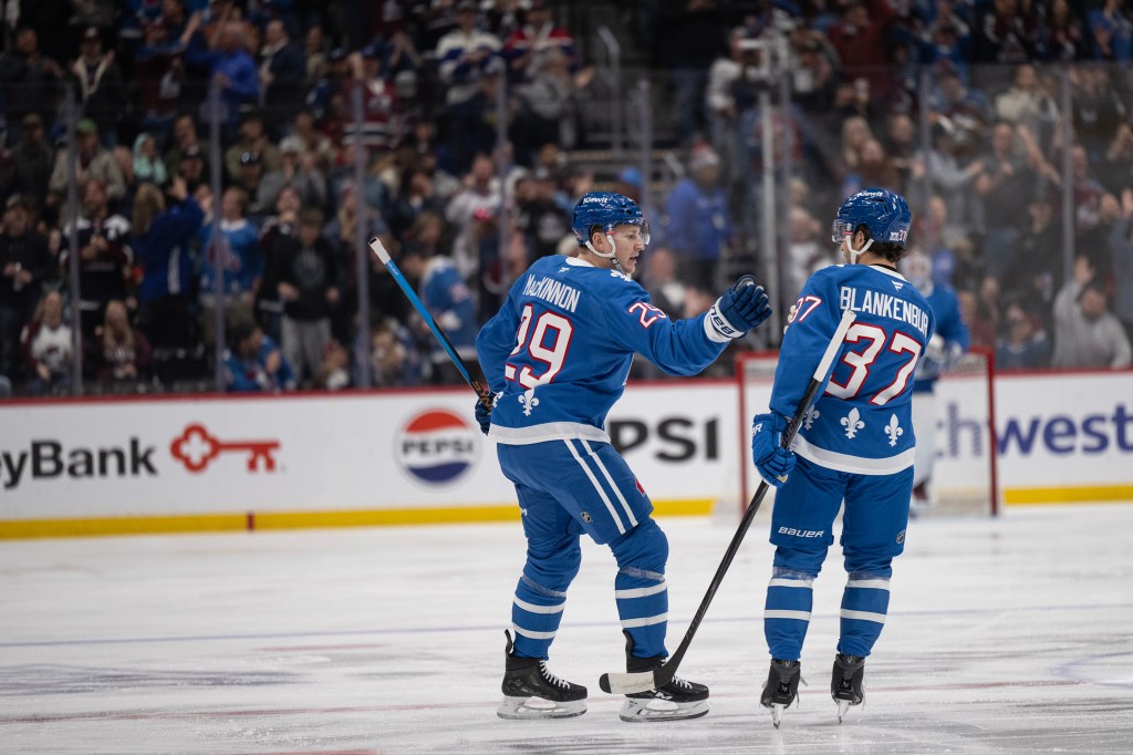 League-worst Canucks stun Avalanche 8-6; MacKinnon scores 50th goal